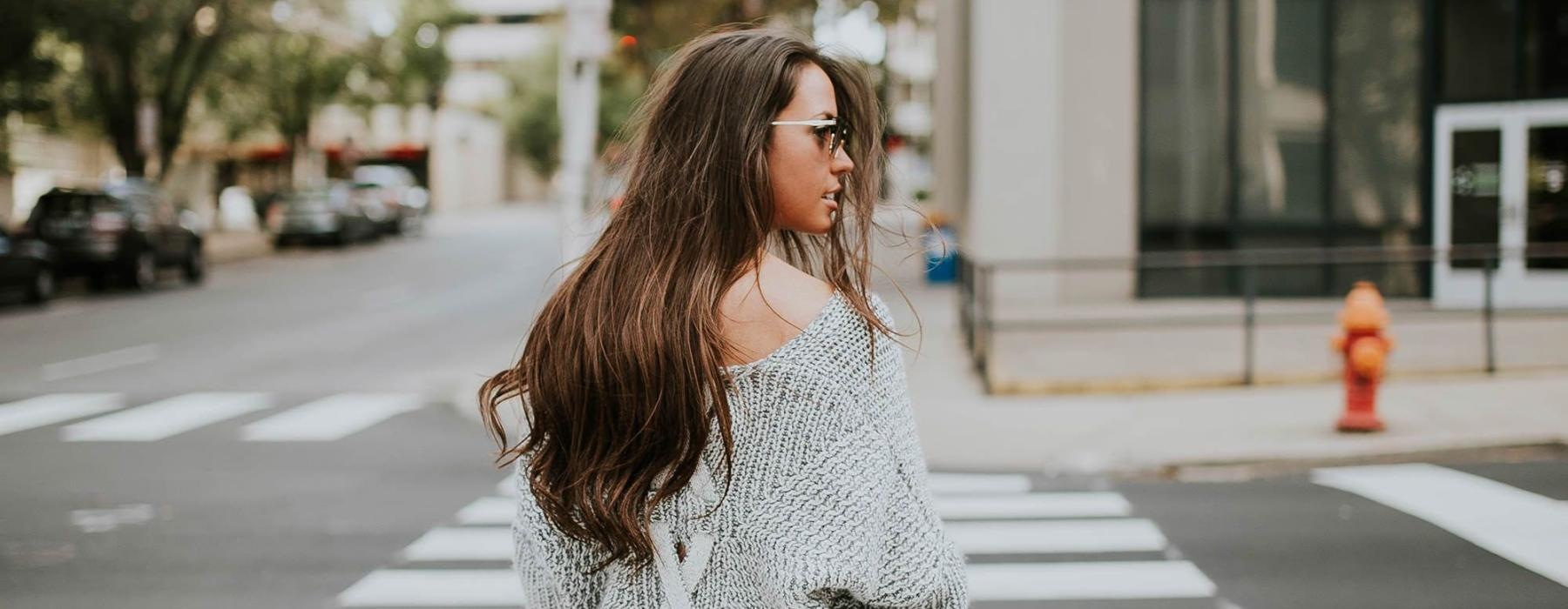 a person walking in a crosswalk