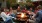 a group of people sitting around a firepit